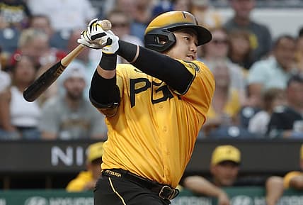 Jul 28, 2023; Pittsburgh, Pennsylvania, USA; Pittsburgh Pirates first baseman Ji Man Choi (91) hits an RBI double against the Philadelphia Phillies during the fourth inning at PNC Park. Mandatory Credit: Charles LeClaire-USA TODAY Sports