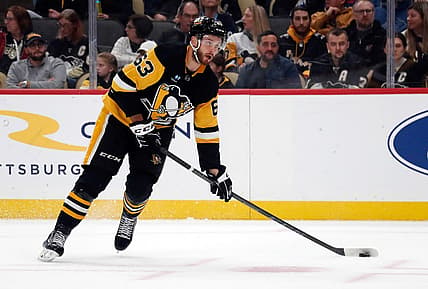 Nov 19, 2023; Pittsburgh, Pennsylvania, USA;  Pittsburgh Penguins left wing Radim Zohrna (63) moves the puck against the Vegas Golden Knights during the first period at PPG Paints Arena. Mandatory Credit: Charles LeClaire-USA TODAY Sports