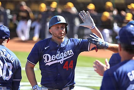 Feb 22, 2024; Peoria, Arizona, USA; Los Angeles Dodgers infielder Kevin Padlo celebrates with teammates after hitting a home run against the San Diego Padres during a spring training game at Peoria Sports Complex. Mandatory Credit: Mark J. Rebilas-USA TODAY Sports