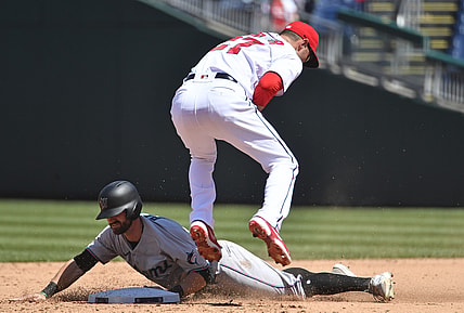 May 2, 2021; Washington, District of Columbia, USA; Miami Marlins third baseman Jon Berti (5) steals second base under the tag by Washington Nationals second baseman Jordy Mercer (27) at Nationals Park. Mandatory Credit: Brad Mills-USA TODAY Sports