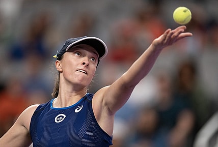 Nov 6, 2022; Forth Worth, TX, USA; Iga Swiatek (POL) tosses the ball to serve during her semi final match against Aryna Sabalenka on day seven of the WTA Finals at Dickies Arena. Mandatory Credit: Susan Mullane-USA TODAY Sports