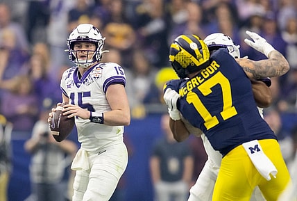 Dec 31, 2022; Glendale, Arizona, USA; TCU Horned Frogs quarterback Max Duggan (15) against the Michigan Wolverines during the 2022 Fiesta Bowl at State Farm Stadium. Mandatory Credit: Mark J. Rebilas-USA TODAY Sports