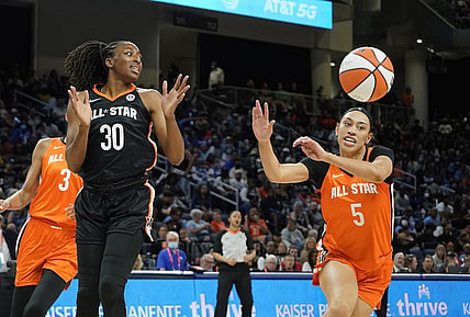 Jul 10, 2022; Chicago, Ill, USA; Team Stewart center Nneka Ogwumike (3) and Team Wilson guard Dearica Hammy (5) go for the ball during the first half in a WNBA All Star Game at Wintrust Arena. Mandatory Credit: David Banks-USA TODAY Sports