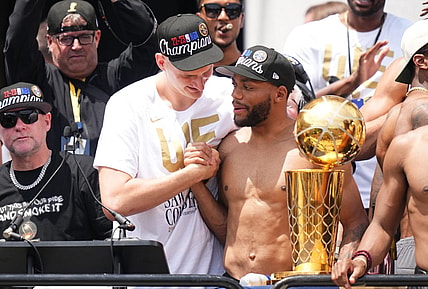 Jun 15, 2023; Denver, CO, USA; Denver Nuggets center Nikola Jokic (15) and Denver Nuggets forward Bruce Brown (11) during the championship parade after the Denver Nuggets won the 2023 NBA Finals. Mandatory Credit: Ron Chenoy-USA TODAY Sports