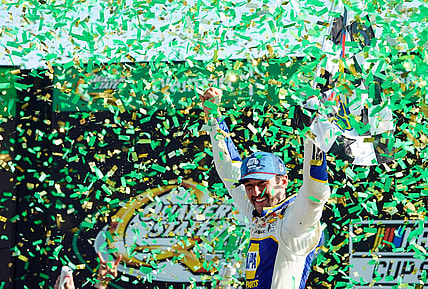 Jul 10, 2022; Hampton, Georgia, USA; NASCAR Cup Series driver Chase Elliott (9) celebrates in Victory Lane winning the Quaker State 400 at Atlanta Motor Speedway. Mandatory Credit: John David Mercer-USA TODAY Sports