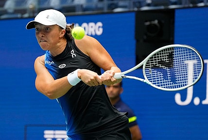 Aug 28, 2023; Flushing, NY, USA; Iga Swiatek of Poland hits to Rebecca Peterson of Sweden on day one of the 2023 U.S. Open tennis tournament at USTA Billie Jean King National Tennis Center. Mandatory Credit: Robert Deutsch-USA TODAY Sports