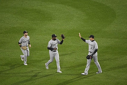 Sep 23, 2023; Boston, Massachusetts, USA;  Chicago White Sox center fielder Trayce Thompson (43) high fives center fielder Luis Robert Jr. (88) after defeating the Boston Red Sox at Fenway Park. Mandatory Credit: Bob DeChiara-USA TODAY Sports