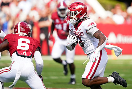 Oct 14, 2023; Tuscaloosa, Alabama, USA; Arkansas Razorbacks tight end Ty Washington (8) runs the ball up the field against the Alabama Crimson Tide during the first quarter at Bryant-Denny Stadium. Mandatory Credit: John David Mercer-USA TODAY Sports