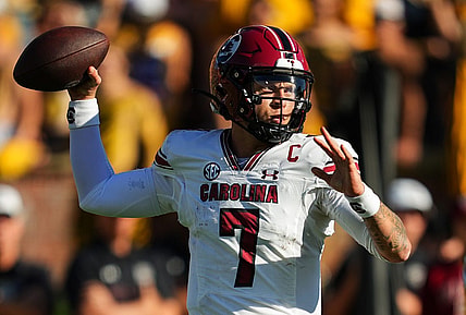 Oct 21, 2023; Columbia, Missouri, USA; South Carolina Gamecocks quarterback Spencer Rattler (7) throws a pass against the Missouri Tigers during the first half at Faurot Field at Memorial Stadium. Mandatory Credit: Jay Biggerstaff-USA TODAY Sports