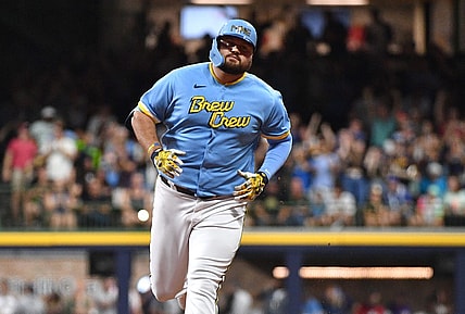 Aug 25, 2023; Milwaukee, Wisconsin, USA; Milwaukee Brewers first baseman Rowdy Tellez (11) rounds the bases after hitting a home run agains the San Diego Padres in the third inning at American Family Field. Mandatory Credit: Michael McLoone-USA TODAY Sports