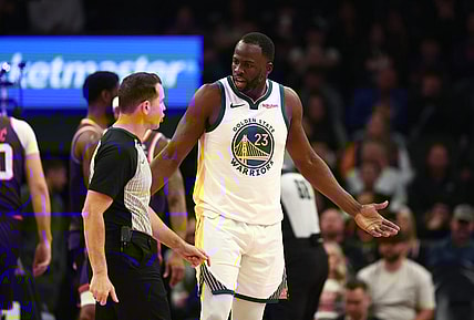 Dec 12, 2023; Phoenix, Arizona, USA; Golden State Warriors forward Draymond Green (23) reacts as he argues with an NBA referee against the Phoenix Suns at Footprint Center. Mandatory Credit: Mark J. Rebilas-USA TODAY Sports