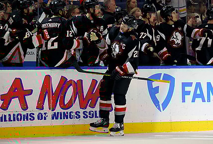 Feb 13, 2024; Buffalo, New York, USA;  Buffalo Sabres right wing Kyle Okposo (21) celebrates his goal with teammates during the first period against the Los Angeles Kings at KeyBank Center. Mandatory Credit: Timothy T. Ludwig-USA TODAY Sports