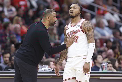 Feb 23, 2024; Houston, Texas, USA; Houston Rockets head coach Ime Udoka talks with forward Cam Whitmore (7) during the third quarter against the Phoenix Suns at Toyota Center. Mandatory Credit: Troy Taormina-USA TODAY Sports