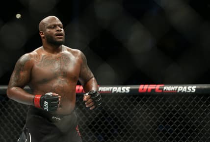 Feb 8, 2020; Houston, Texas, USA; Derrick Lewis (red gloves) fights Ilir Latifi (blue gloves) during UFC 247 at Toyota Center. Mandatory Credit: Thomas Shea-USA TODAY Sports