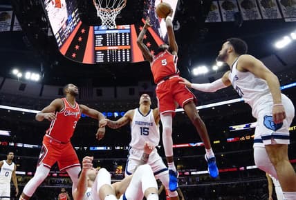 Feb 26, 2022; Chicago, Illinois, USA; Chicago Bulls forward Derrick Jones Jr. (5) shoots against the Memphis Grizzlies during the first half at United Center. Mandatory Credit: David Banks-USA TODAY Sports