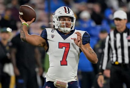 Nov 12, 2022; Pasadena, California, USA;  Arizona Wildcats quarterback Jayden de Laura (7) passes the ball in the first half against the UCLA Bruins at the Rose Bowl. Mandatory Credit: Jayne Kamin-Oncea-USA TODAY Sports