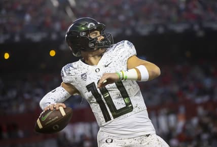 Oct 8, 2022; Tucson, Arizona, USA; Oregon Ducks quarterback Bo Nix (10) against the Arizona Wildcats at Arizona Stadium. Mandatory Credit: Mark J. Rebilas-USA TODAY Sports