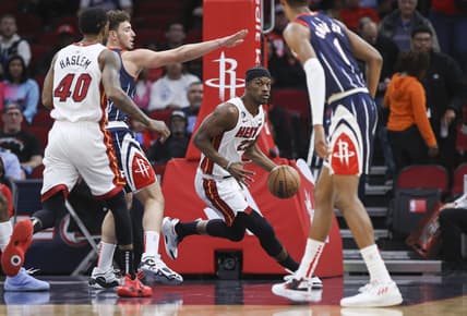 Dec 15, 2022; Houston, Texas, USA; Miami Heat forward Jimmy Butler (22) dribbles the ball during the first quarter against the Houston Rockets at Toyota Center. Mandatory Credit: Troy Taormina-USA TODAY Sports