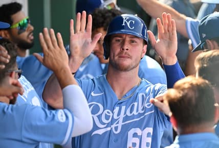 Aug 22, 2022; Kansas City, Missouri, USA;  Kansas City Royals designated hitter Ryan O'Hearn (66) celebrates after scoring a run in the dugout during the eighth inning against the Chicago White Sox at Kauffman Stadium. Mandatory Credit: Peter Aiken-USA TODAY Sports