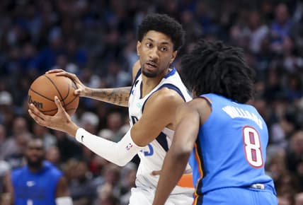 Dec 12, 2022; Dallas, Texas, USA; Dallas Mavericks forward Christian Wood (35) looks to score as Oklahoma City Thunder forward Jalen Williams (8) defends during the second half at American Airlines Center. Mandatory Credit: Kevin Jairaj-USA TODAY Sports