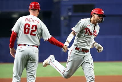 Jul 5, 2023; St. Petersburg, Florida, USA; Philadelphia Phillies right fielder Nick Castellanos (8) is congratulated  by third base coach Dusty Wathan (62) after hitting a home run against the Tampa Bay Rays during the sixth inning at Tropicana Field. Mandatory Credit: Kim Klement-USA TODAY Sports