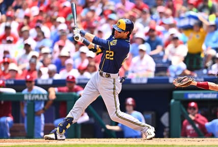 Jul 20, 2023; Philadelphia, Pennsylvania, USA; Milwaukee Brewers outfielder Christian Yelich (22) hits a three-run home run against the Philadelphia Phillies in the third inning at Citizens Bank Park. Mandatory Credit: Kyle Ross-USA TODAY Sports