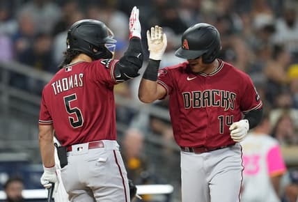 Aug 17, 2023; San Diego, California, USA;  Arizona Diamondbacks catcher Gabriel Moreno (14) is greeted by center fielder Alek Thomas (5) after hitting a solo home run against the San Diego Padres during the fifth inning at Petco Park. Mandatory Credit: Ray Acevedo-USA TODAY Sports