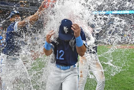 Sep 1, 2023; Kansas City, Missouri, USA;  Kansas City Royals designated hitter Nick Loftin (12) gets doused with water following a win over the Boston Red Sox at Kauffman Stadium. Mandatory Credit: Peter Aiken-USA TODAY Sports