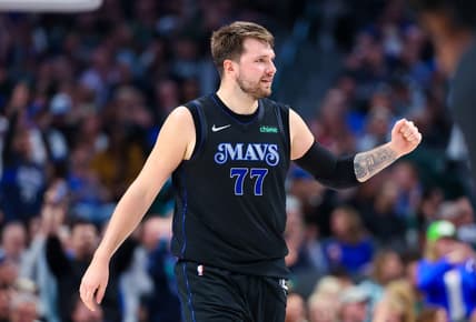 Mar 21, 2024; Dallas, Texas, USA;  Dallas Mavericks guard Luka Doncic (77) reacts during the first half against the Utah Jazz at American Airlines Center. Mandatory Credit: Kevin Jairaj-USA TODAY Sports