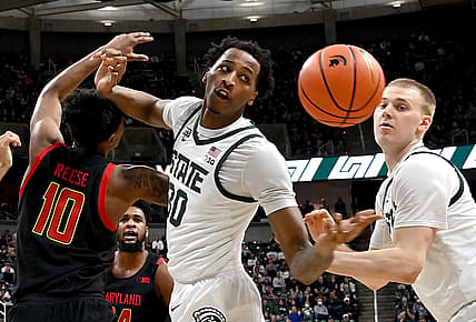 Mar 6, 2022; East Lansing, Michigan, USA;  Michigan State Spartans forward Marcus Bingham Jr. (30) grabs a rebound in the first half against the Maryland Terrapins with Michigan State Spartans forward Joey Hauser (10) at Jack Breslin Student Events Center. Mandatory Credit: Dale Young-USA TODAY Sports