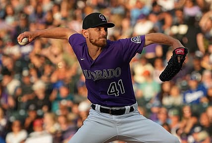 Jun 27, 2022; Denver, Colorado, USA; Colorado Rockies starting pitcher Chad Kuhl (41) delivers a pitch in the fourth inning against the Los Angeles Dodgers at Coors Field. Mandatory Credit: Ron Chenoy-USA TODAY Sports