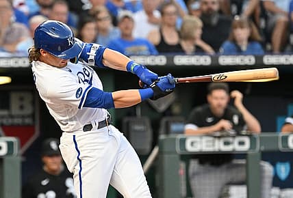 Aug 10, 2022; Kansas City, Missouri, USA;  Kansas City Royals third baseman Bobby Witt Jr. (7) hits an RBI single during the third inning against the Chicago White Sox at Kauffman Stadium. Mandatory Credit: Peter Aiken-USA TODAY Sports