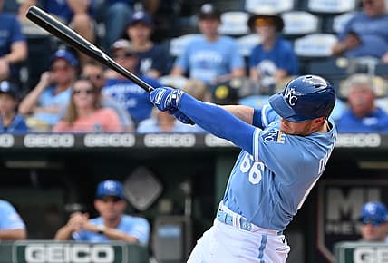 Aug 22, 2022; Kansas City, Missouri, USA;  Kansas City Royals designated hitter Ryan O'Hearn (66) hits a RBI single during the first inning against the Chicago White Sox at Kauffman Stadium. Mandatory Credit: Peter Aiken-USA TODAY Sports