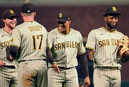 Aug 29, 2022; San Francisco, California, USA; San Diego Padres first baseman Brandon Drury (17) celebrates with right fielder Juan Soto (22) after a win against the San Francisco Giants at Oracle Park. Mandatory Credit: Kelley L Cox-USA TODAY Sports