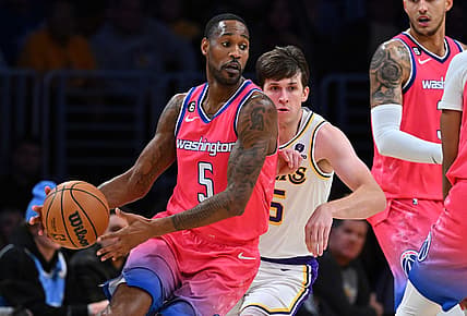Dec 18, 2022; Los Angeles, California, USA; Los Angeles Lakers guard Austin Reaves (15) chases down Washington Wizards forward Will Barton (5) in the first half at Crypto.com Arena. Mandatory Credit: Jayne Kamin-Oncea-USA TODAY Sports