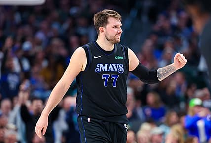 Mar 21, 2024; Dallas, Texas, USA;  Dallas Mavericks guard Luka Doncic (77) reacts during the first half against the Utah Jazz at American Airlines Center. Mandatory Credit: Kevin Jairaj-USA TODAY Sports