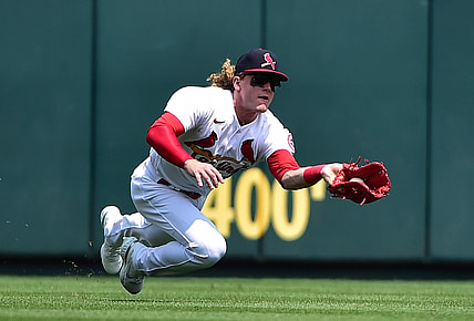 Aug 1, 2021; St. Louis, Missouri, USA;  St. Louis Cardinals center fielder Harrison Bader (48) dives and catches a ball hit by Minnesota Twins third baseman Luis Arraez (not pictured) during the fourth inning at Busch Stadium. Mandatory Credit: Jeff Curry-USA TODAY Sports