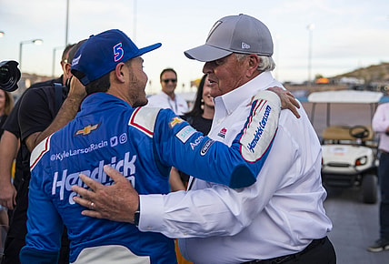 Nov 7, 2021; Avondale, Arizona, USA; NASCAR Cup Series driver Kyle Larson (left) celebrates with team owner Rick Hendrick after winning the NASCAR Cup Series Championship at Phoenix Raceway. Mandatory Credit: Mark J. Rebilas-USA TODAY Sports