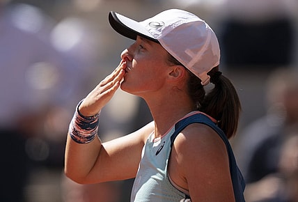 June 1, 2022; Paris, France; Iga Swiatek (POL) celebrates winning her match against Jessica Pegula (USA) on day 11 of the French Open at Stade Roland-Garros. Mandatory Credit: Susan Mullane-USA TODAY Sports