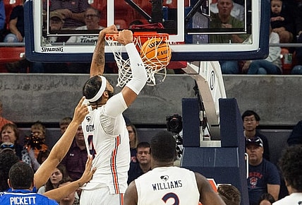 Auburn Tigers forward Johni Broome (4) dunks the ball as Auburn Tigers take on St. Louis Billikens at Neville Arena in Auburn, Ala., on Sunday, Nov. 27, 2022.