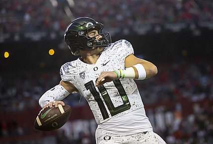 Oct 8, 2022; Tucson, Arizona, USA; Oregon Ducks quarterback Bo Nix (10) against the Arizona Wildcats at Arizona Stadium. Mandatory Credit: Mark J. Rebilas-USA TODAY Sports