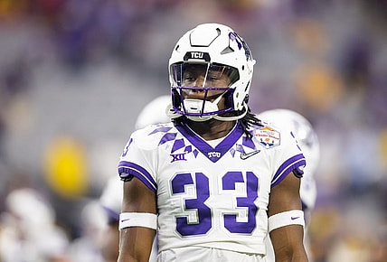 Dec 31, 2022; Glendale, Arizona, USA; TCU Horned Frogs running back Kendre Miller (33) against the Michigan Wolverines during the 2022 Fiesta Bowl at State Farm Stadium. Mandatory Credit: Mark J. Rebilas-USA TODAY Sports