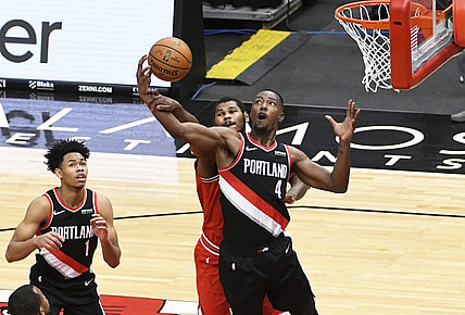 Jan 30, 2021; Chicago, Illinois, USA; Portland Trail Blazers forward Harry Giles III (4) grabs a rebound in front of Chicago Bulls forward Cristiano Felicio (6) during the first half at United Center. Mandatory Credit: David Banks-USA TODAY Sports