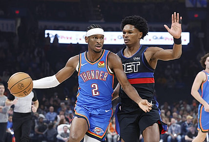 Oct 30, 2023; Oklahoma City, Oklahoma, USA; Oklahoma City Thunder guard Shai Gilgeous-Alexander (2) drives around Detroit Pistons guard Killian Hayes (7) during the first quarter at Paycom Center. Mandatory Credit: Alonzo Adams-USA TODAY Sports