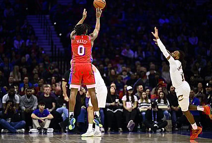 Feb 23, 2024; Philadelphia, Pennsylvania, USA; Philadelphia 76ers guard Tyrese Maxey (0) shoots against Cleveland Cavaliers guard Darius Garland (10) in the first quarter at Wells Fargo Center. Mandatory Credit: Kyle Ross-USA TODAY Sports