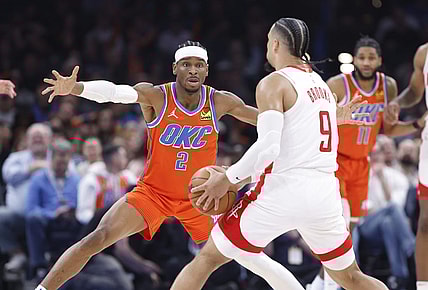 Feb 27, 2024; Oklahoma City, Oklahoma, USA; Oklahoma City Thunder guard Shai Gilgeous-Alexander (2) defends Houston Rockets forward Dillon Brooks (9) during the second quarter at Paycom Center. Mandatory Credit: Alonzo Adams-USA TODAY Sports