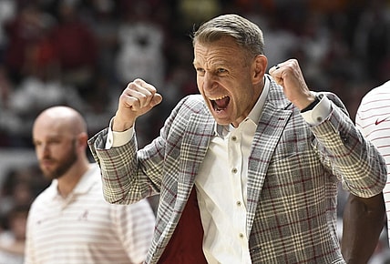 Mar 2, 2024; Tuscaloosa, Alabama, USA;  Alabama head coach Nate Oats cheers on his team as they play Tennessee at Coleman Coliseum. Mandatory Credit: Gary Cosby Jr.-USA TODAY Sports