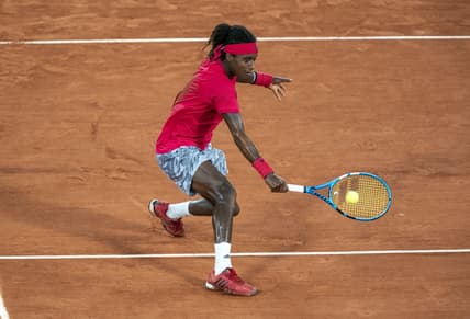 Sep 29, Paris, France; Mikael Ymer (SWE) in action during his match against Novak Djokovic (SRB) on day three at Stade Roland Garros. Mandatory Credit: Susan Mullane-USA TODAY Sports