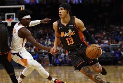 Mar 8, 2022; Orlando, Florida, USA; Orlando Magic guard R.J. Hampton (13) drives to the basket against the Phoenix Suns during the second quarter at Amway Center. Mandatory Credit: Kim Klement-USA TODAY Sports