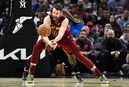 Mar 26, 2022; Cleveland, Ohio, USA; Chicago Bulls forward Javonte Green (24) knocks the ball from Cleveland Cavaliers forward Kevin Love (0) during the second half at Rocket Mortgage FieldHouse. Mandatory Credit: Ken Blaze-USA TODAY Sports